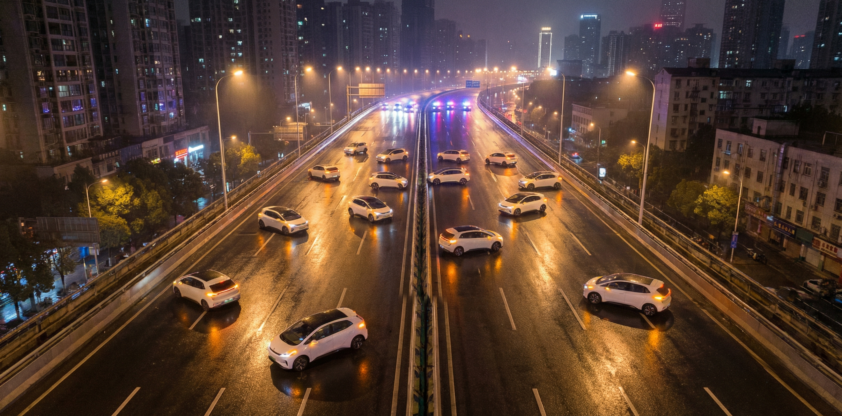 Multiple white autonomous vehicles stopped at irregular angles across a multi-lane urban expressway at night, hazard lights glowing amber with emergency strobes approaching in the distance